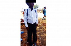 Wearing a new school uniform donated by Praised and Salvation Foundation…
